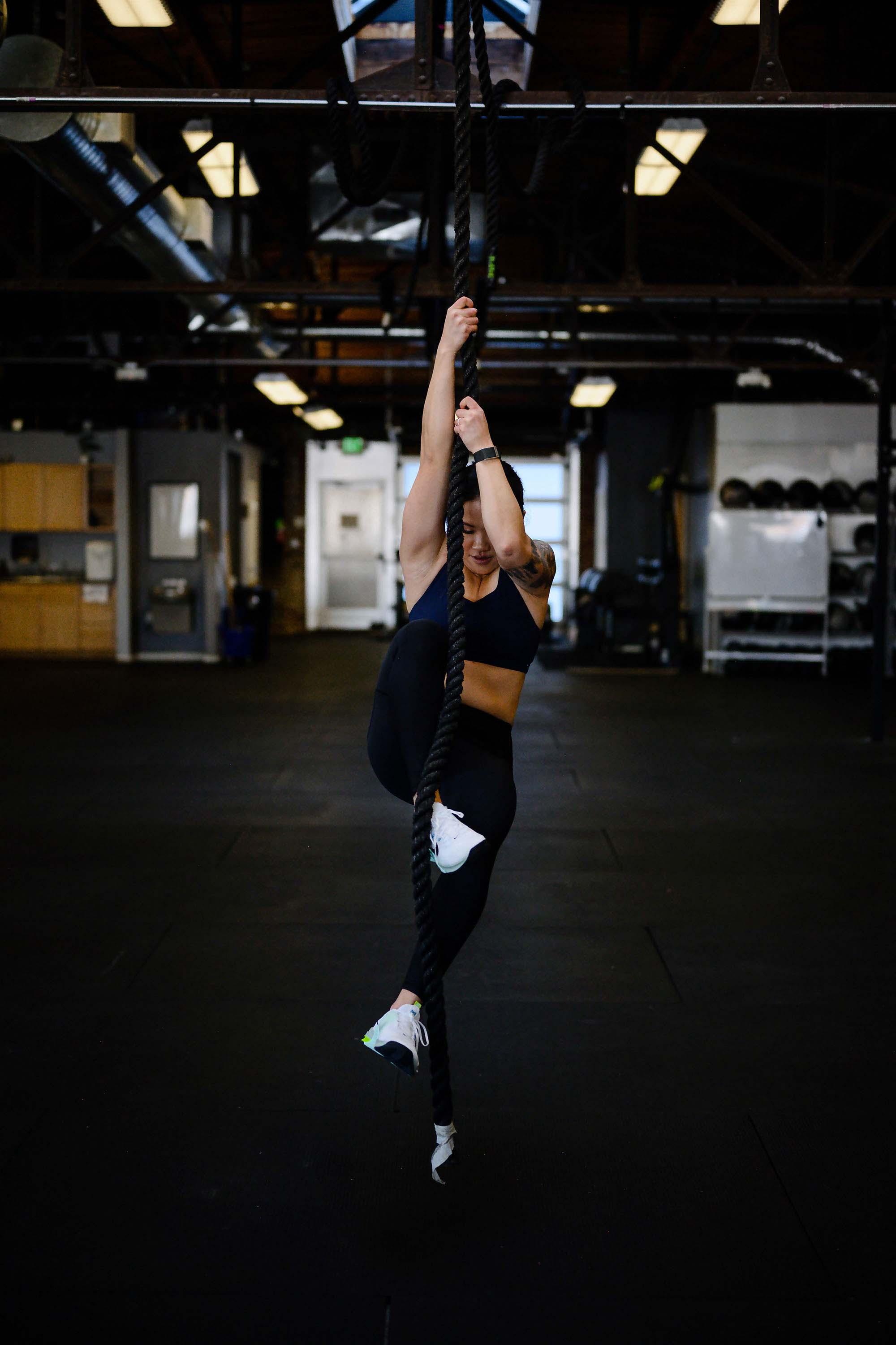 Picture of Michelle climbing a rope