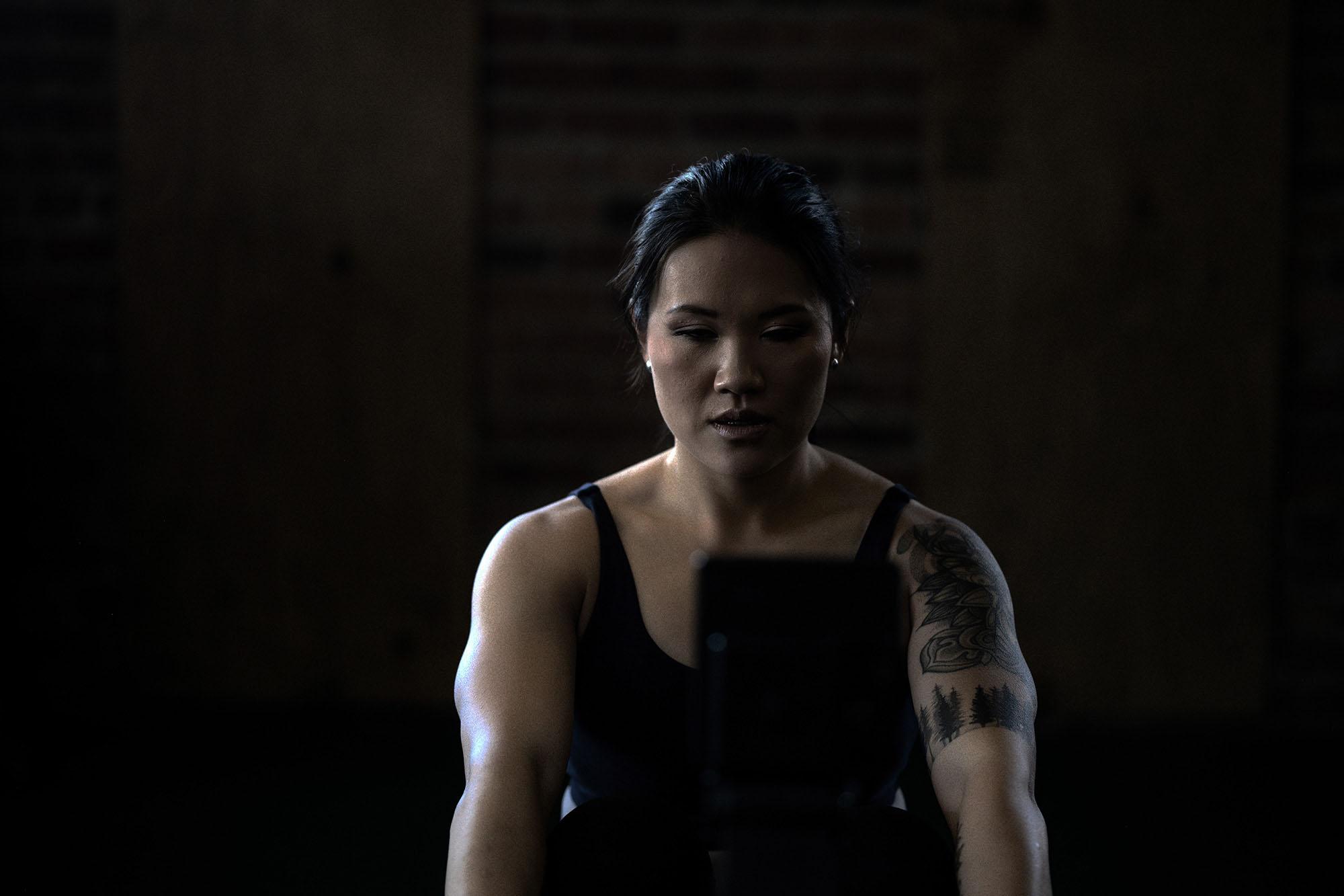 Picture of Michelle exercising on a rowing machine